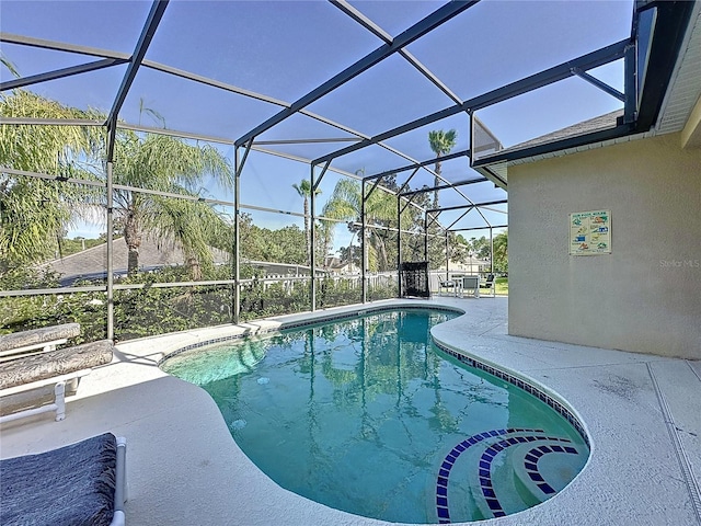 107 Amaca Ln, Davenport, FL 33897 - outdoor pool with a patio and a lanai