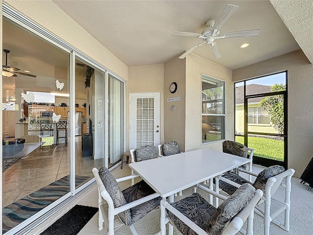 107 Amaca Ln, Davenport, FL 33897 - sunroom / solarium featuring ceiling fan and outdoor dining space