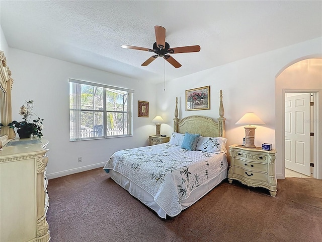 107 Amaca Ln, Davenport, FL 33897 - carpeted bedroom featuring arched walkways and ceiling fan
