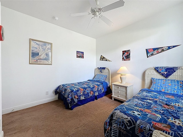 107 Amaca Ln, Davenport, FL 33897 - carpeted bedroom featuring baseboards and ceiling fan