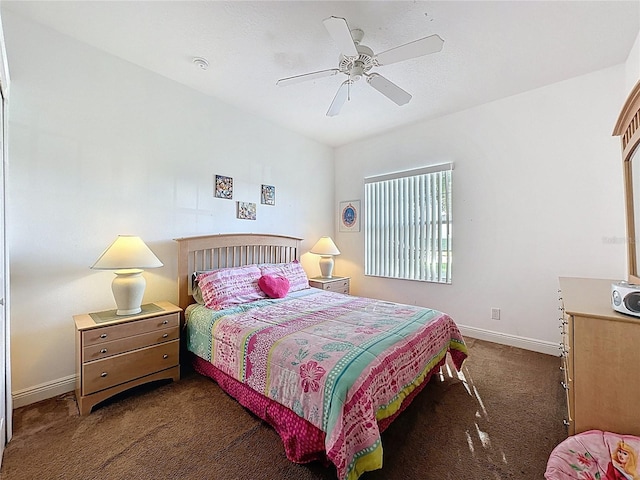 107 Amaca Ln, Davenport, FL 33897 - carpeted bedroom featuring baseboards and a ceiling fan