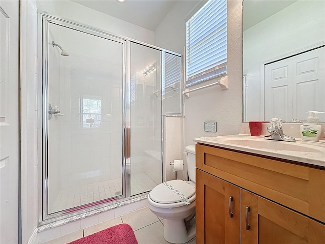 107 Amaca Ln, Davenport, FL 33897 - bathroom featuring tile patterned flooring, vanity, and a stall shower