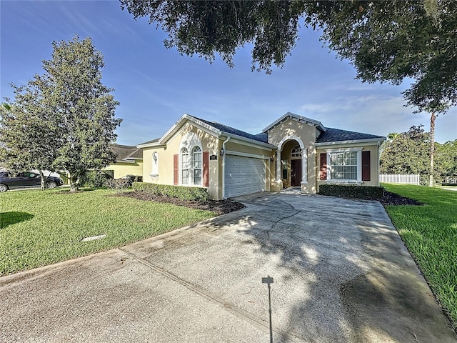 107 Amaca Ln, Davenport, FL 33897 - ranch-style house with stucco siding, an attached garage, and driveway