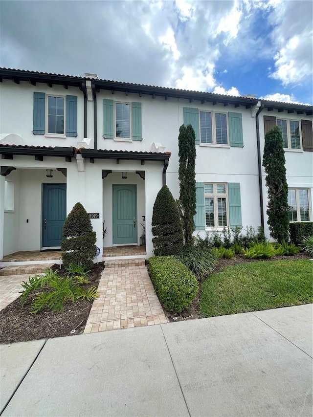 8919 Lakeshore Pointe Dr, Winter Garden, FL 34787 - townhome / multi-family property featuring stucco siding