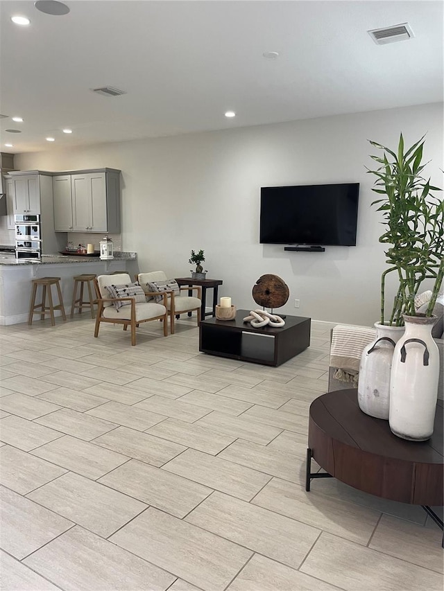 8919 Lakeshore Pointe Dr, Winter Garden, FL 34787 - living room featuring recessed lighting