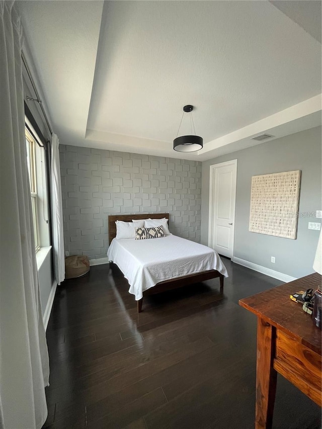 8919 Lakeshore Pointe Dr, Winter Garden, FL 34787 - bedroom featuring dark wood-style floors