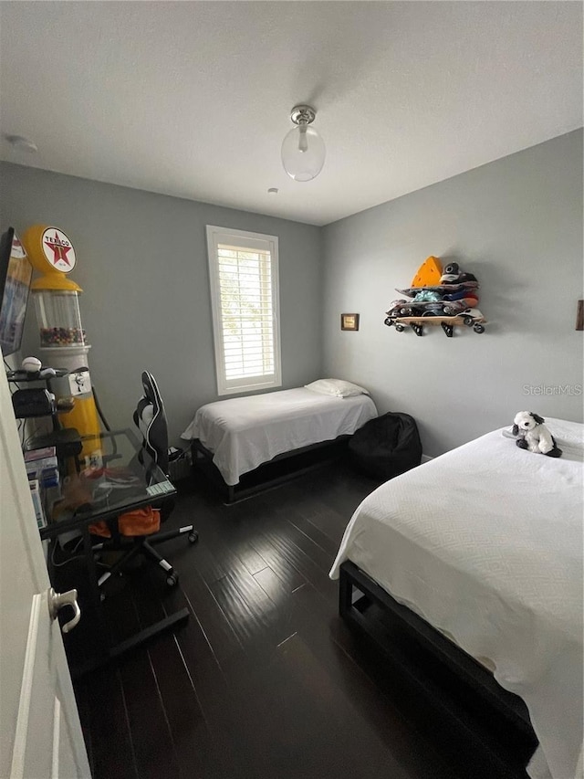 8919 Lakeshore Pointe Dr, Winter Garden, FL 34787 - bedroom featuring wood finished floors