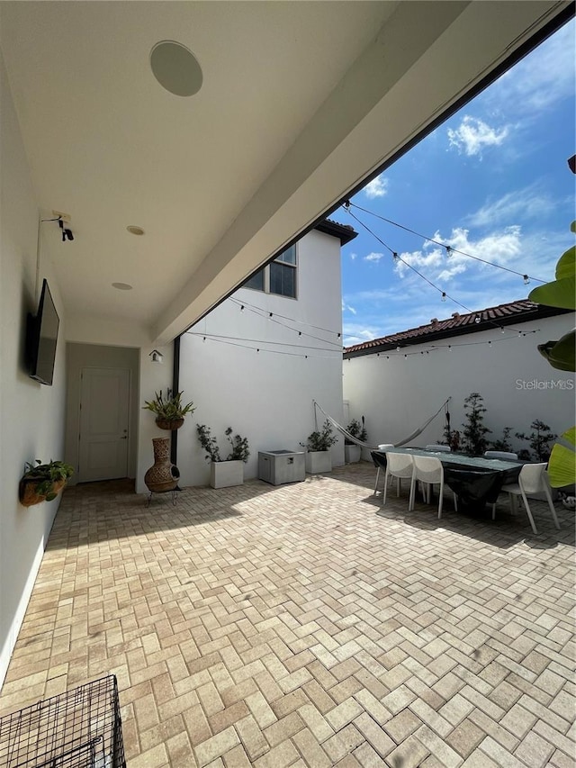 8919 Lakeshore Pointe Dr, Winter Garden, FL 34787 - view of patio / terrace with outdoor dining space