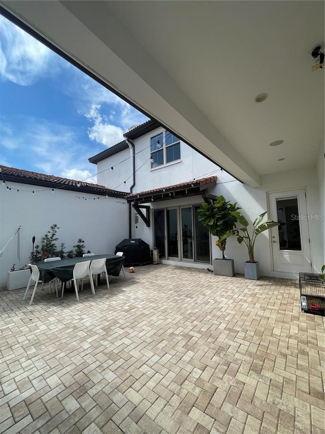 8919 Lakeshore Pointe Dr, Winter Garden, FL 34787 - view of patio featuring outdoor dining area