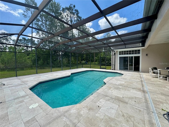 2356 Chadwick Cir, Kissimmee, FL 34746 - outdoor pool featuring a patio area and glass enclosure