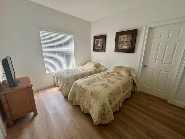 2356 Chadwick Cir, Kissimmee, FL 34746 - bedroom with wood finished floors and baseboards