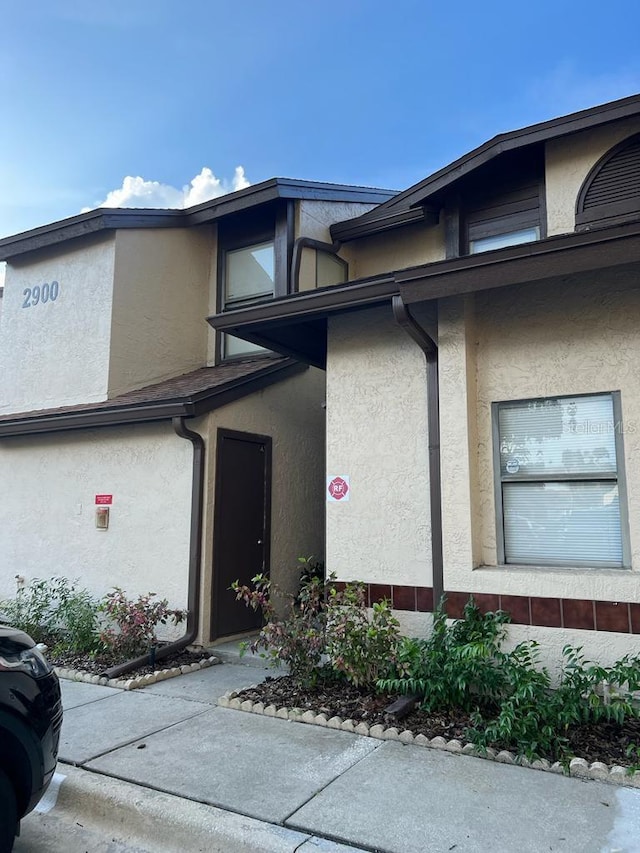 2900 S Semoran Blvd Unit 1, Orlando, FL 32822 - property entrance featuring stucco siding