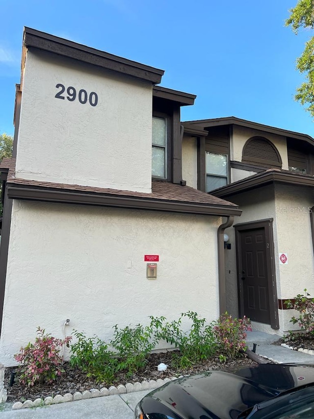 2900 S Semoran Blvd Unit 1, Orlando, FL 32822 - view of front of house featuring stucco siding