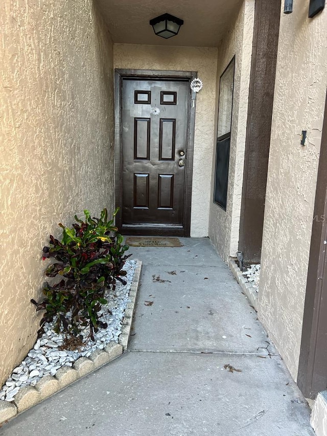 2900 S Semoran Blvd Unit 1, Orlando, FL 32822 - property entrance with stucco siding