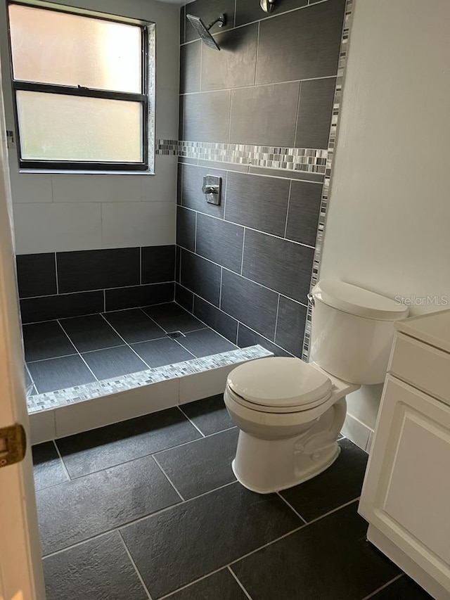 2900 S Semoran Blvd Unit 1, Orlando, FL 32822 - bathroom with toilet, a shower stall, and tile patterned flooring