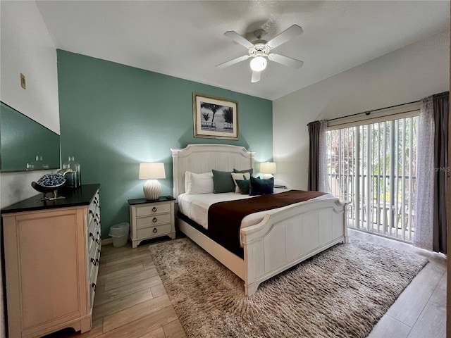 1106 Gran Bahama Blvd Unit 1106, Davenport, FL 33897 - bedroom with access to outside, light wood finished floors, and a ceiling fan