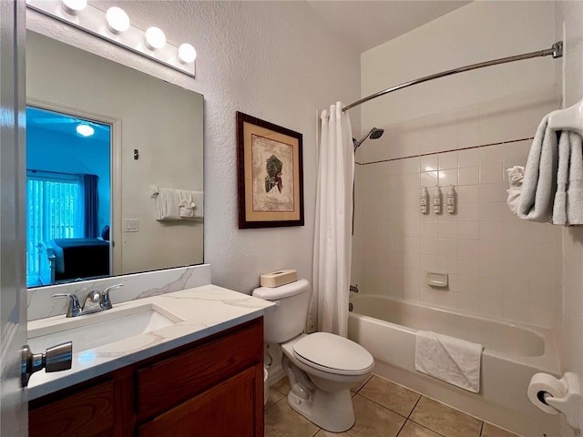 1106 Gran Bahama Blvd Unit 1106, Davenport, FL 33897 - bathroom with tile patterned flooring, shower / bath combo, vanity, and a textured wall