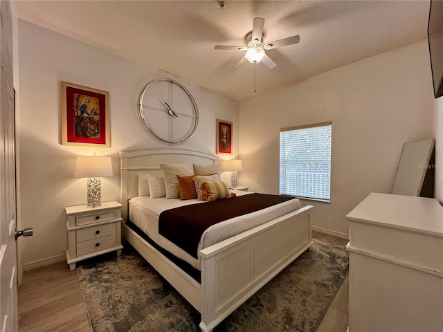 1106 Gran Bahama Blvd Unit 1106, Davenport, FL 33897 - bedroom with wood finished floors and a ceiling fan