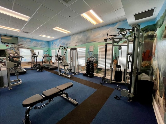 1106 Gran Bahama Blvd Unit 1106, Davenport, FL 33897 - exercise room featuring a drop ceiling and healthy amount of natural light