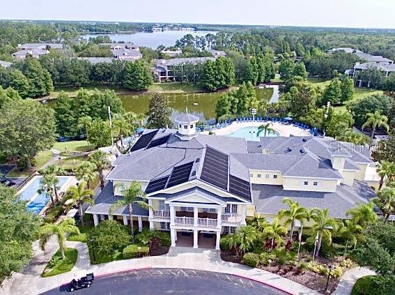 1106 Gran Bahama Blvd Unit 1106, Davenport, FL 33897 - aerial view of property and surrounding area with a pool area and a large body of water