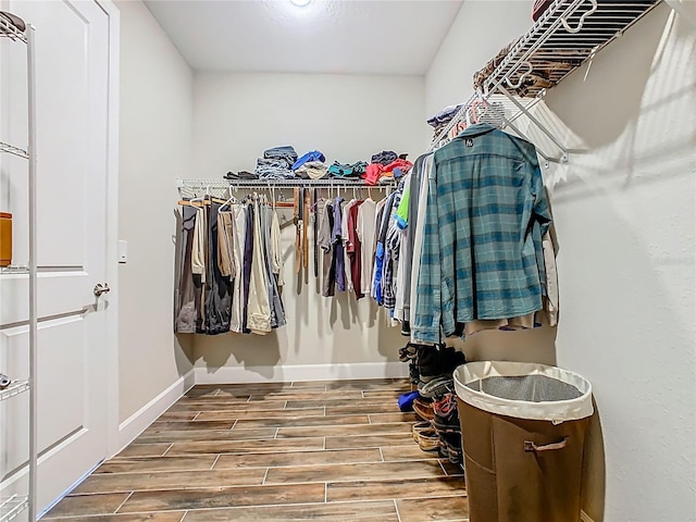 605 San Augusto Dr, Kissimmee, FL 34759 - spacious closet featuring wood finished floors