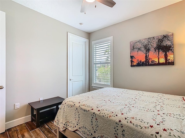 605 San Augusto Dr, Kissimmee, FL 34759 - bedroom featuring dark wood-style floors and ceiling fan