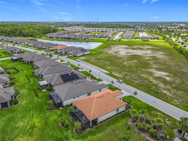 605 San Augusto Dr, Kissimmee, FL 34759 - aerial view of residential area featuring a large body of water