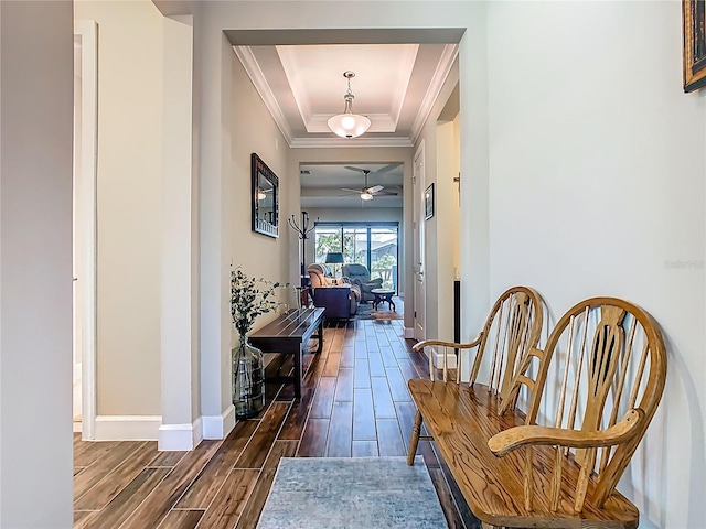 605 San Augusto Dr, Kissimmee, FL 34759 - corridor with a raised ceiling, wood tiled floors, and ornamental molding