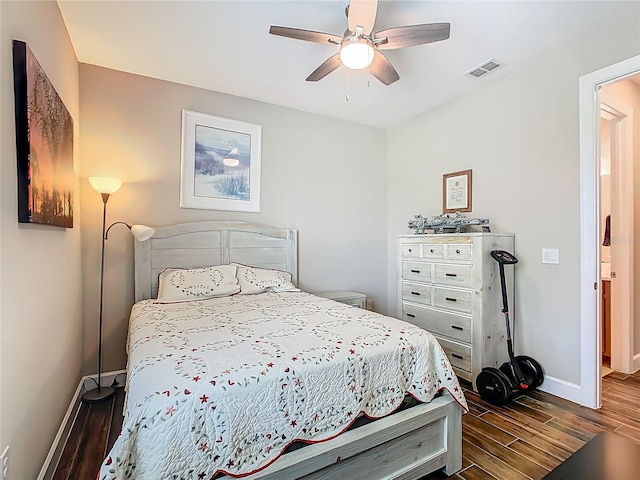 605 San Augusto Dr, Kissimmee, FL 34759 - bedroom with dark wood finished floors and a ceiling fan