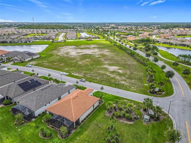 605 San Augusto Dr, Kissimmee, FL 34759 - aerial view of residential area with a large body of water
