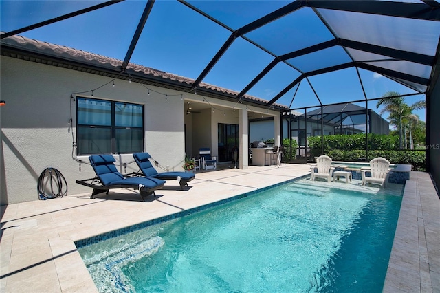 14553 Eagle Branch Dr, Nokomis, FL 34275 - swimming pool featuring a patio area, a hot tub, and glass enclosure