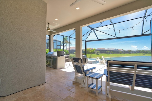 14553 Eagle Branch Dr, Nokomis, FL 34275 - view of patio featuring an outdoor kitchen, an outdoor pool, glass enclosure, and a ceiling fan