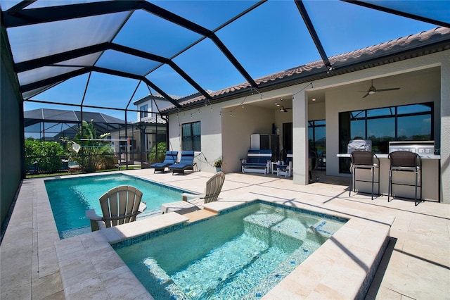 14553 Eagle Branch Dr, Nokomis, FL 34275 - view of pool with a patio, ceiling fan, a bar, area for grilling, and a pool with connected hot tub
