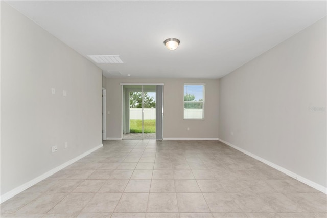 5288 Stephs Field St, Saint Cloud, FL 34771 - spare room featuring baseboards and light tile patterned floors