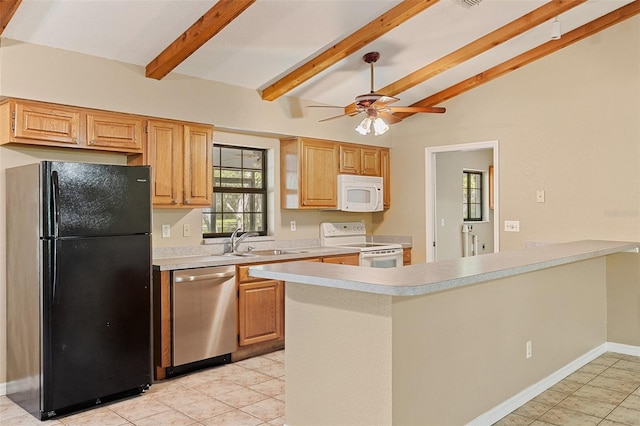 11323 Kijik Trl, Groveland, FL 34736 - kitchen with white appliances, light countertops, ceiling fan, light tile patterned flooring, and a peninsula