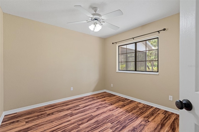 11323 Kijik Trl, Groveland, FL 34736 - spare room featuring wood finished floors and a ceiling fan