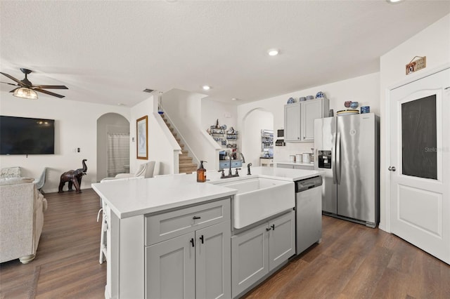 176 Sofia Ln, Lake Alfred, FL 33850 - kitchen featuring arched walkways, stainless steel appliances, open floor plan, a sink, and recessed lighting
