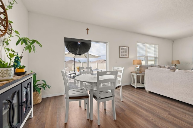 176 Sofia Ln, Lake Alfred, FL 33850 - dining room with wood finished floors and baseboards