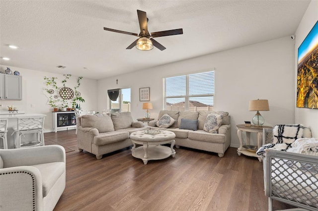 176 Sofia Ln, Lake Alfred, FL 33850 - living area with a ceiling fan, dark wood-style floors, a textured ceiling, recessed lighting, and baseboards