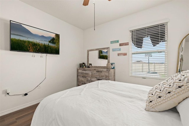 176 Sofia Ln, Lake Alfred, FL 33850 - bedroom featuring dark wood-style floors, baseboards, and a ceiling fan