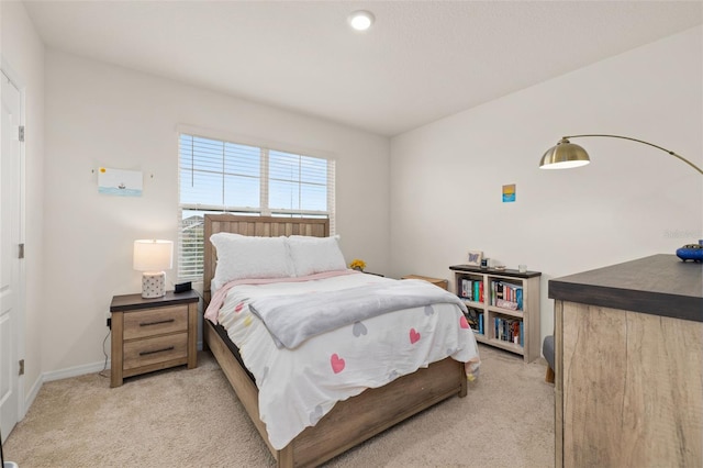 176 Sofia Ln, Lake Alfred, FL 33850 - bedroom with light carpet and baseboards