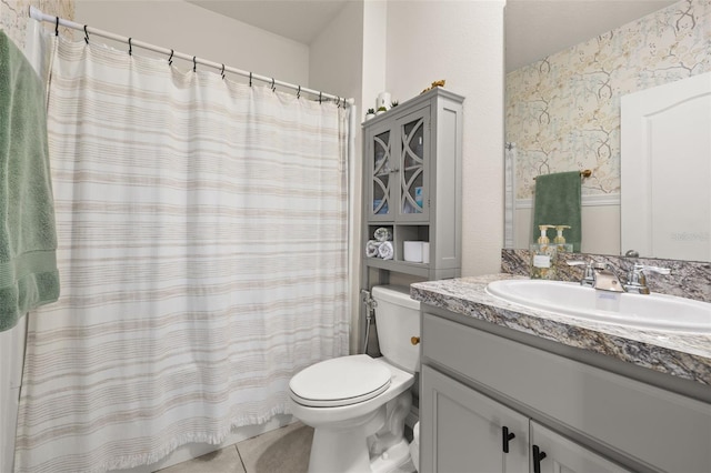 176 Sofia Ln, Lake Alfred, FL 33850 - full bath featuring toilet, vanity, tile patterned floors, and a shower with shower curtain