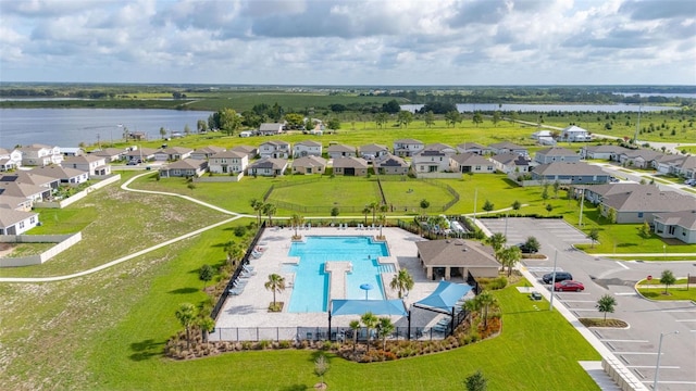 176 Sofia Ln, Lake Alfred, FL 33850 - aerial perspective of suburban area with a pool and a large body of water