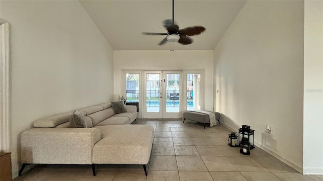 3901 Ballinore Pl, Gotha, FL 34734 - living room featuring vaulted ceiling, light tile patterned flooring, french doors, a ceiling fan, and baseboards