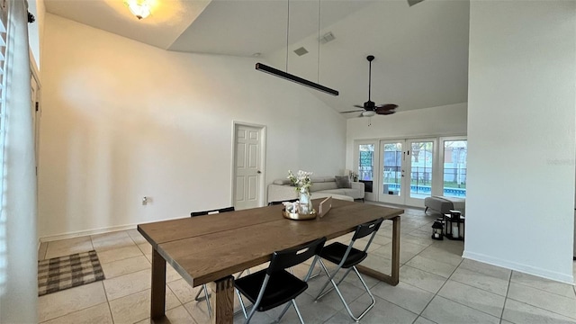 3901 Ballinore Pl, Gotha, FL 34734 - dining room featuring high vaulted ceiling, light tile patterned flooring, ceiling fan, and baseboards