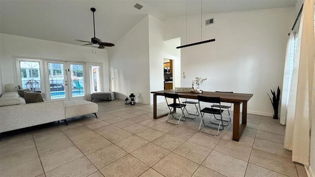 3901 Ballinore Pl, Gotha, FL 34734 - living area with ceiling fan, light tile patterned floors, baseboards, french doors, and high vaulted ceiling
