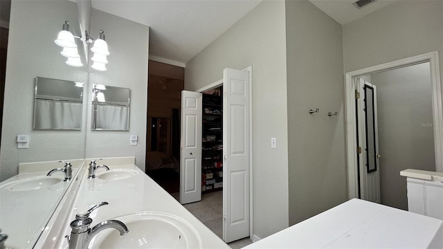 3901 Ballinore Pl, Gotha, FL 34734 - full bathroom with double vanity and tile patterned floors