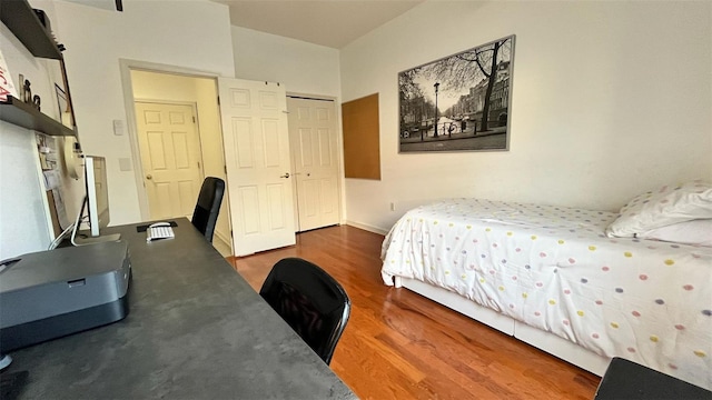3901 Ballinore Pl, Gotha, FL 34734 - bedroom featuring wood finished floors, an office area, and a closet