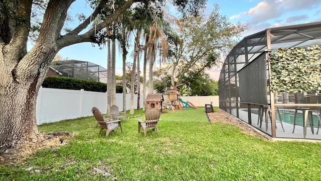 3901 Ballinore Pl, Gotha, FL 34734 - view of yard featuring a playground, an outdoor pool, and a lanai