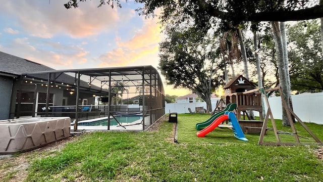 3901 Ballinore Pl, Gotha, FL 34734 - view of yard featuring a playground and a lanai